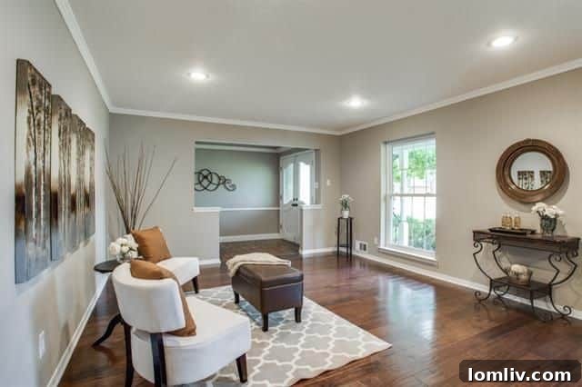 View of the formal dining area with modern pendant lighting