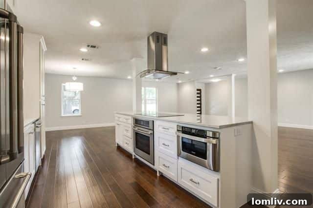 Sleek Kitchen Design with Designer Glass Backsplash