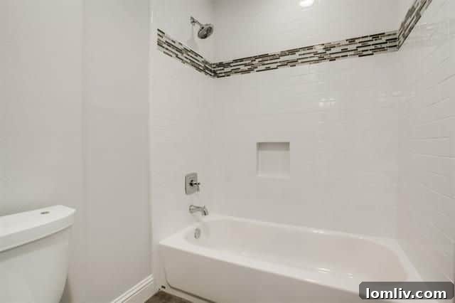 Walk-in Frameless Glass Shower with Porcelain and Marble Tiles