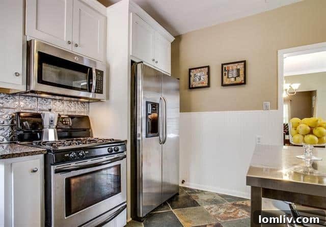 Kitchen Details with Granite Countertops and Tin Backsplash