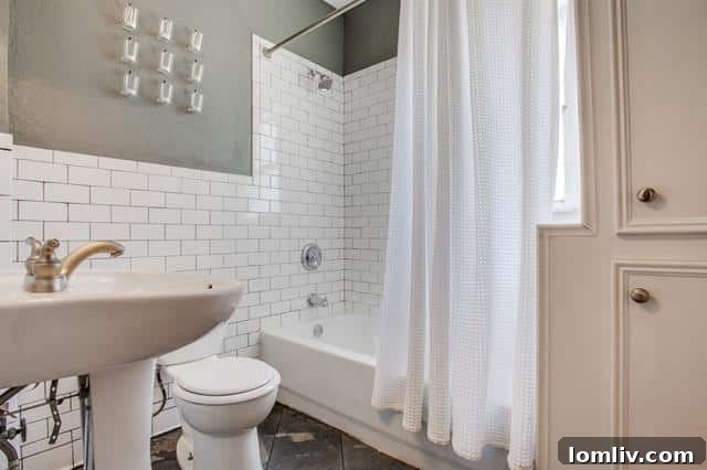 Renovated Second Bathroom with Subway Tile