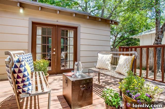 Expansive Outdoor Deck and Flagstone Patio