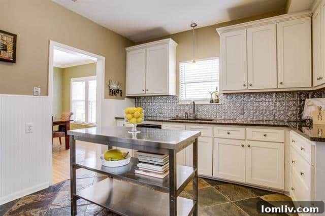 Modern Kitchen with Slate Floors and Stainless Steel Appliances