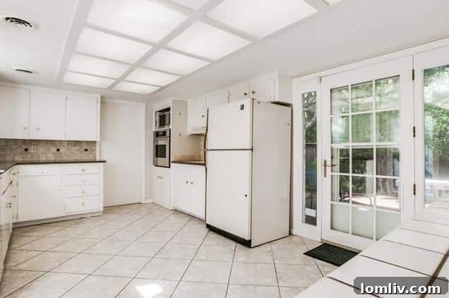Bathroom featuring original mosaic tilework, a key characteristic of midcentury design
