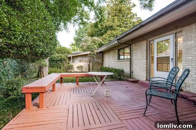 Front exterior of the Merriman Park home, showcasing its midcentury modern profile