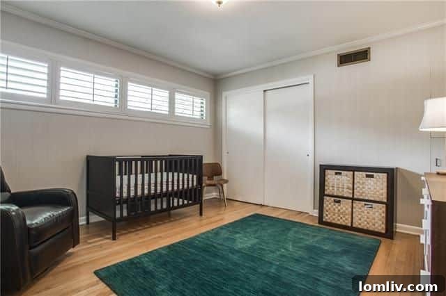 Master bedroom with pink brick accent wall