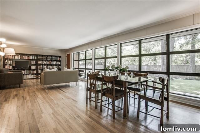 Midcentury living room with backyard view