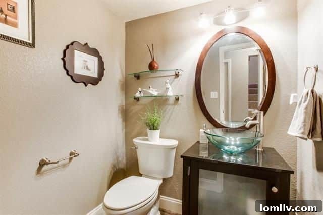 Open concept living and dining area with hardwood floors