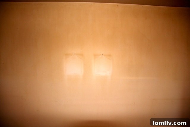 Interior walls heavily stained with tobacco tar in a Stevens Park Village home