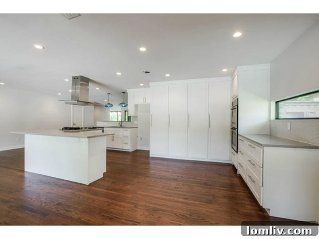 High-End Stainless Steel Appliances and Custom Cabinetry in Kitchen