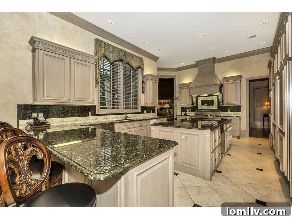 Spacious Master Bedroom with Sitting Area and Luxurious Bedding