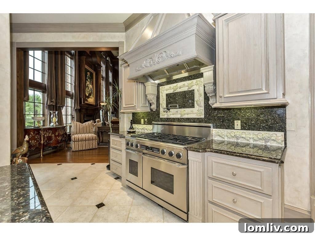 Luxury Master Bathroom with Freestanding Tub, Columns, and Chandelier