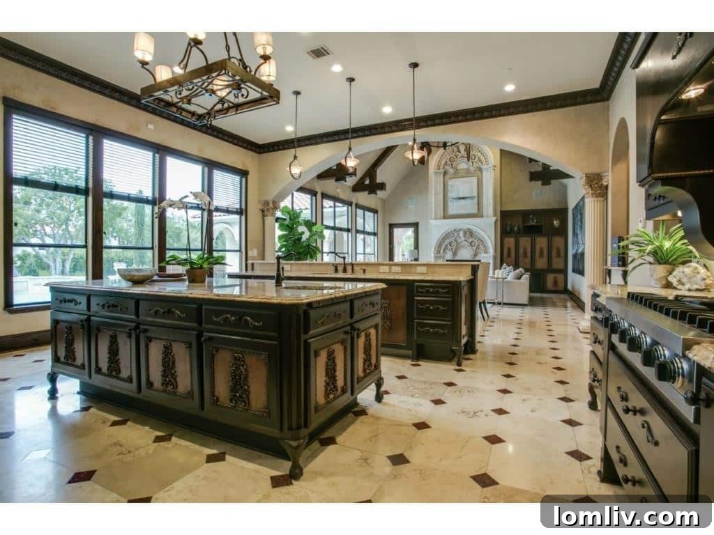 One of the gourmet kitchens in the luxury mansion, featuring high-end appliances.