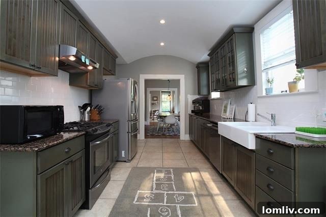 Updated Galley Kitchen with Stainless Steel Appliances