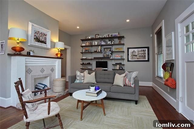 Living Room with Original Fireplace and Hardwoods