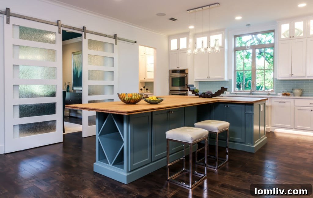 Open-plan kitchen design featuring white cabinets and bamboo countertops