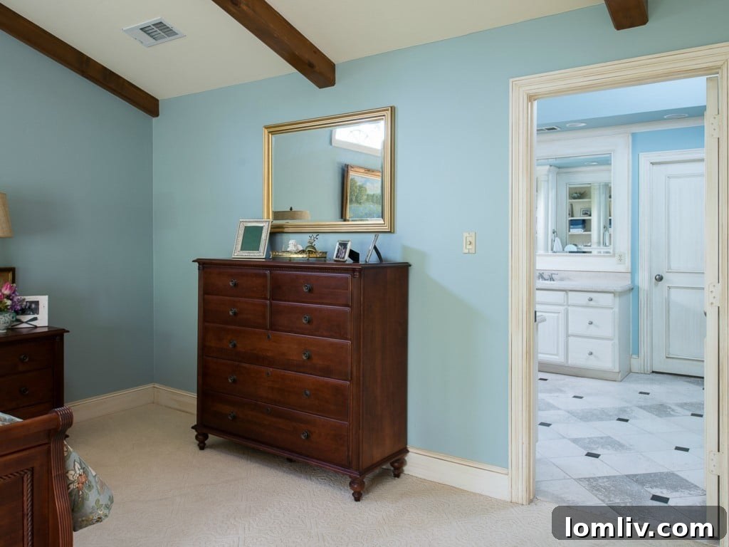 Another view of the spacious master bedroom in 3325 Greenbrier, emphasizing comfort, style, and the bright, airy atmosphere.