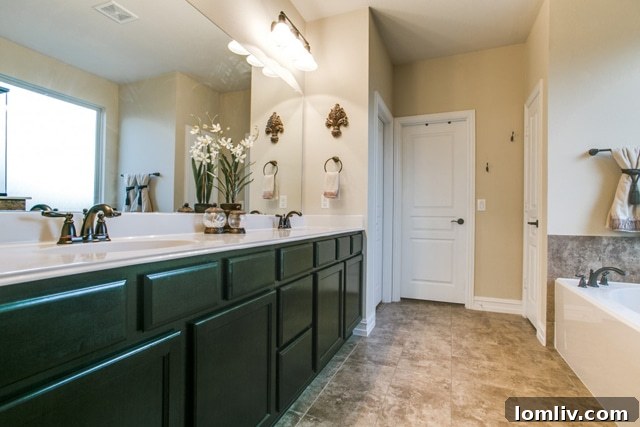 Spacious Master Bedroom with Tray Ceiling and Plantation Shutters
