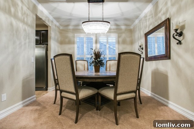 Modern Kitchen with Island and Bar Seating in Allen Home