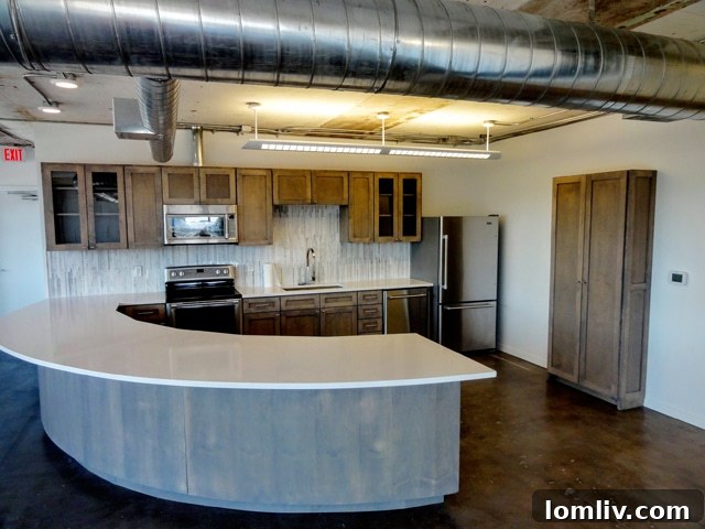 Modern kitchen with high-end appliances in Suite 200, ideal for entertaining and daily living