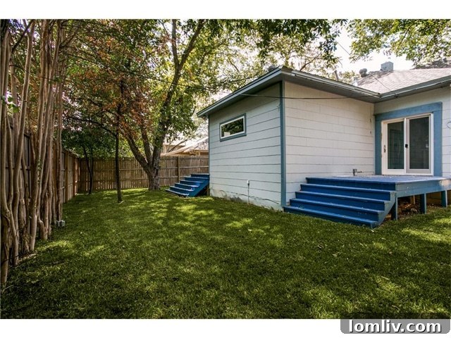 Spacious Backyard with Privacy Fence and Mature Trees