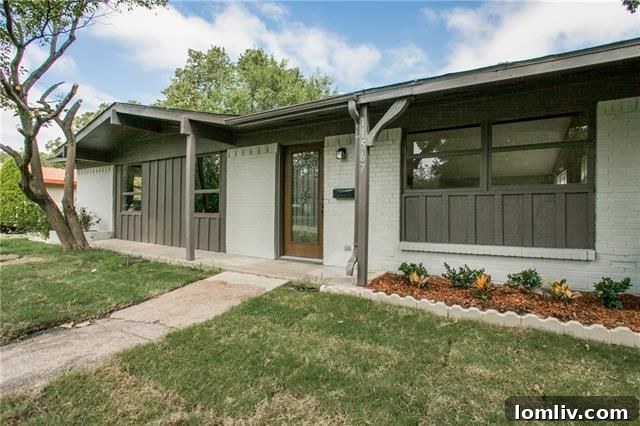 Bright exterior of the updated Northwest Dallas home at 11567 Coral Hills Dr.