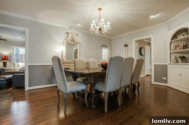 Spacious living room with hardwood floors in East Kessler Park Tudor