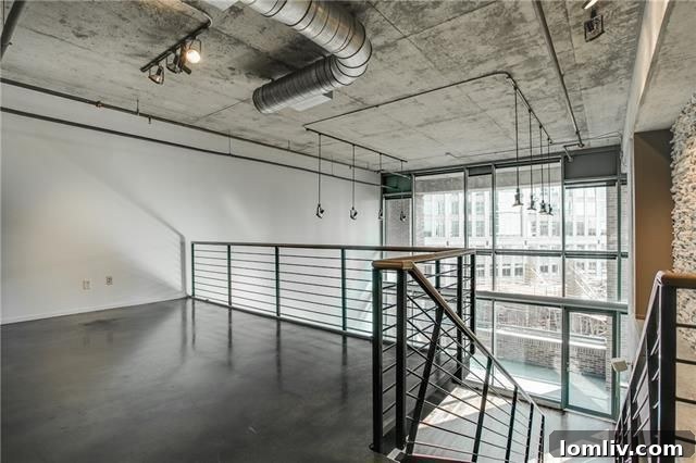Modern living space with high ceilings in 1999 McKinney Ave. Apt 603