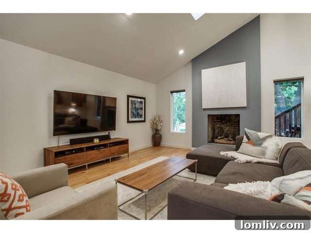 7719 Lemmonwood Living Room - Modern Fireplace and Open Layout