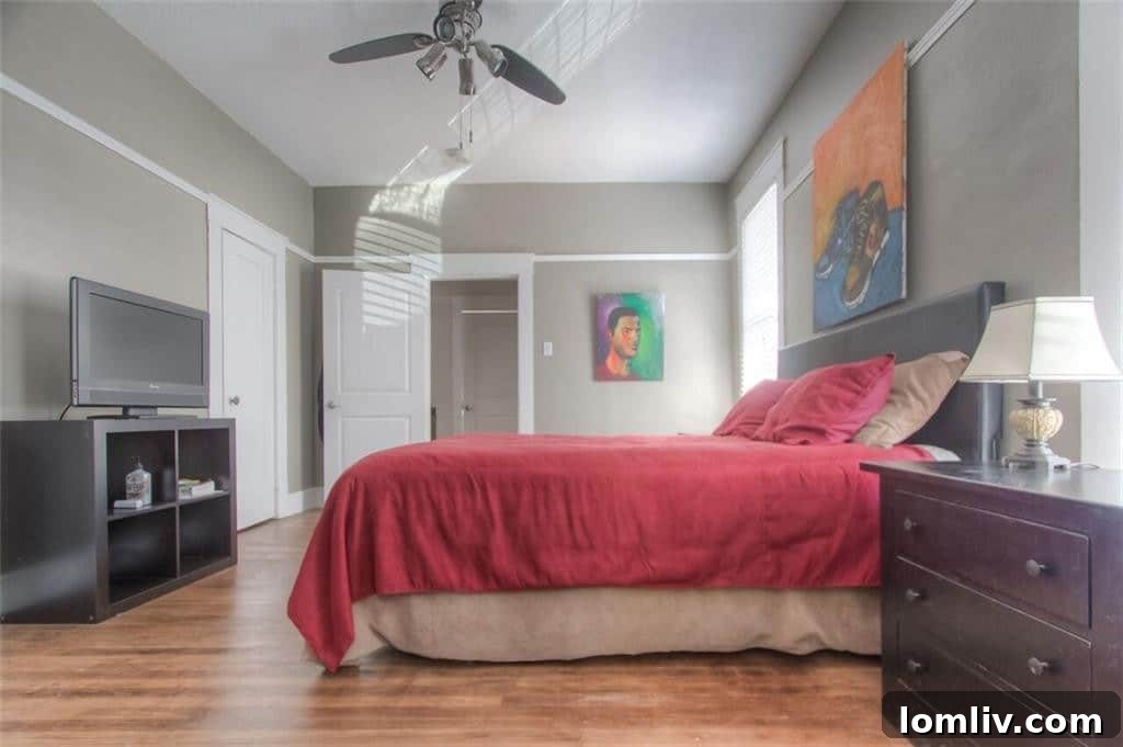 Spacious master bedroom with abundant natural light