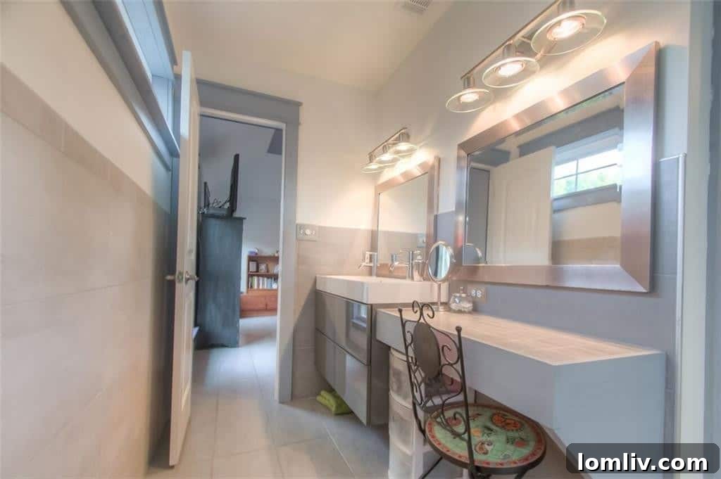 Luxurious master bathroom with double sinks and elegant finishes