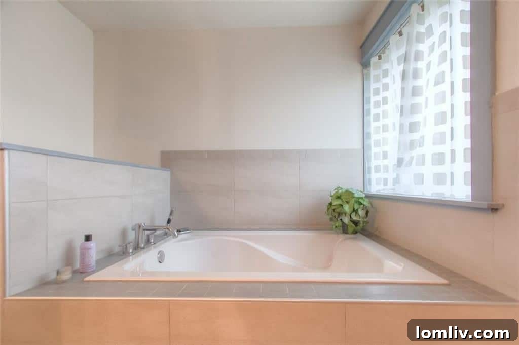 Soaker tub in the master bathroom, designed for relaxation