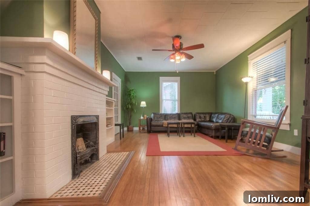 Spacious and light-filled living room, showcasing period details