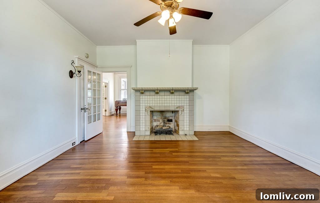 Mystical Allure of Mistletoe Heights Historic Villa 13 Inviting Room with Classic Fireplace and Period Details in Historic Home