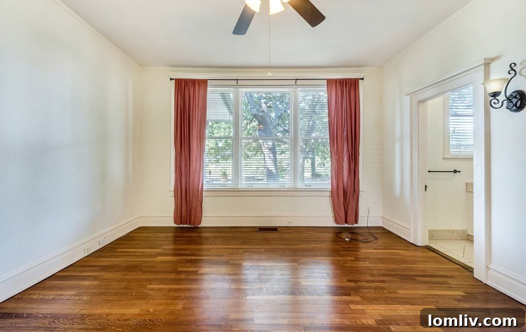 Mystical Allure of Mistletoe Heights Historic Villa 14 Bright and Airy Bedroom with Hardwood Floors and Historical Charm