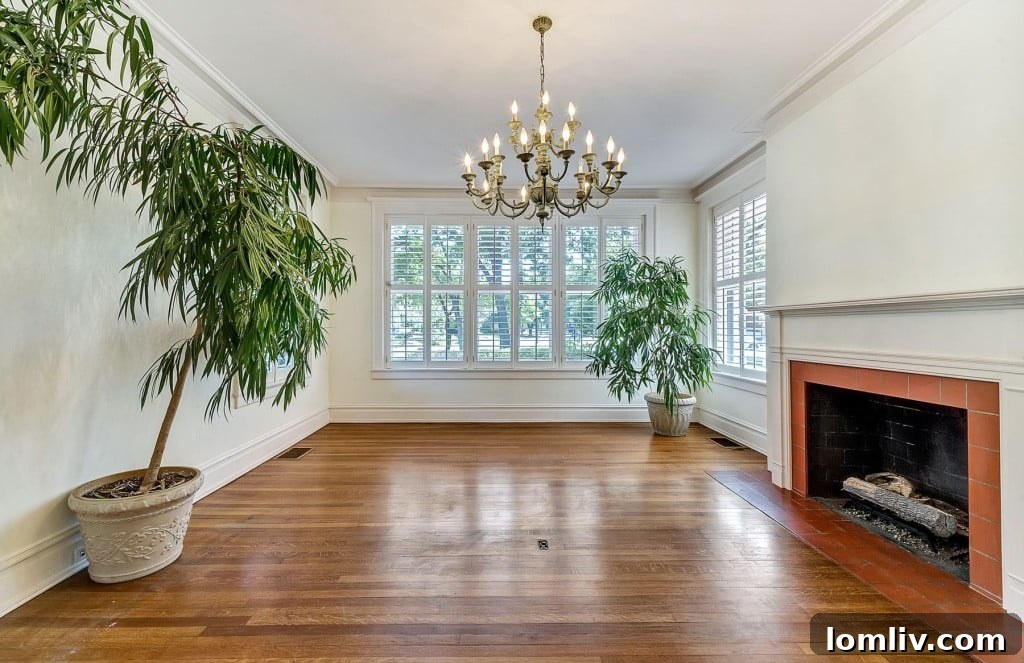 Mystical Allure of Mistletoe Heights Historic Villa 6 Grand Dining Room with Original Moldings and Ample Seating for Entertaining
