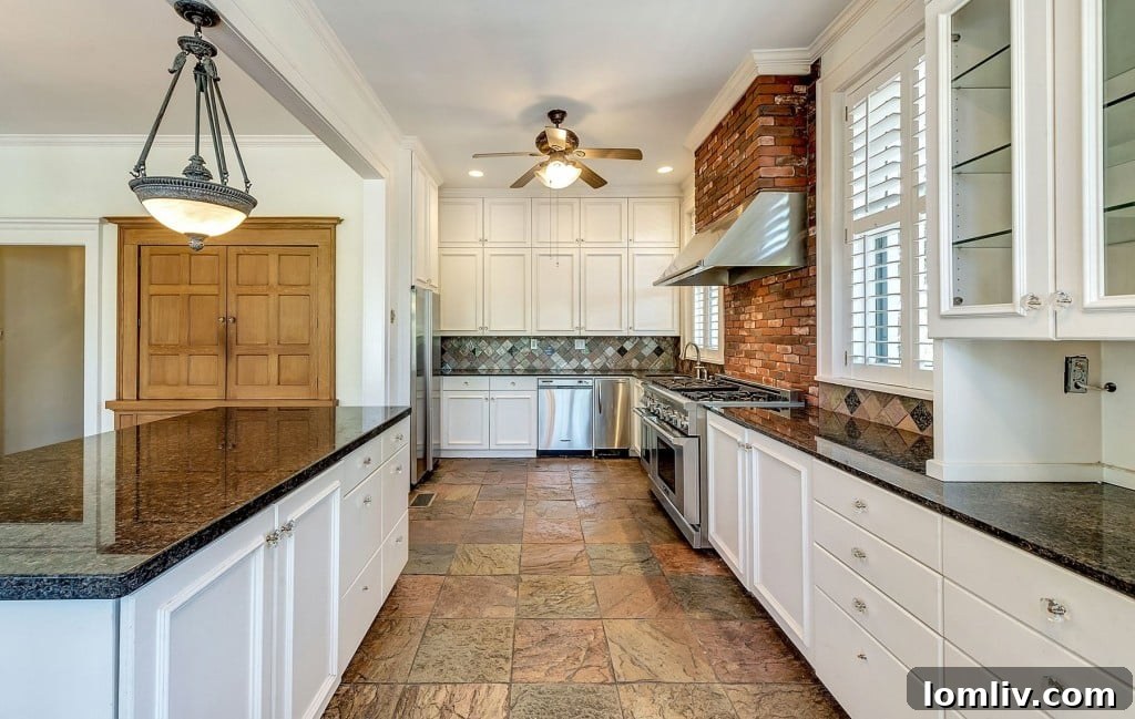 Mystical Allure of Mistletoe Heights Historic Villa 10 Modern Kitchen with Premium Stainless Steel Appliances and Classic Red Brick Backsplash