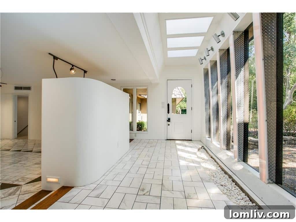 Grand foyer entrance of the historic 8740 Canyon Drive, Dallas