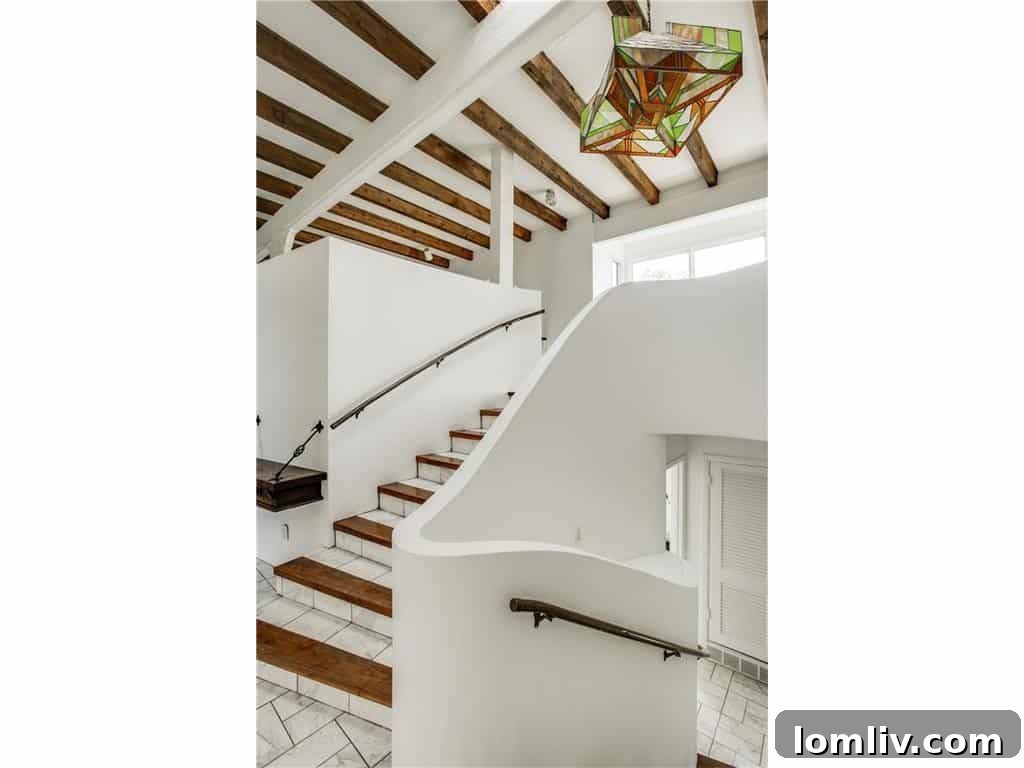 Inviting entry point of 8740 Canyon Drive, showcasing classic architecture