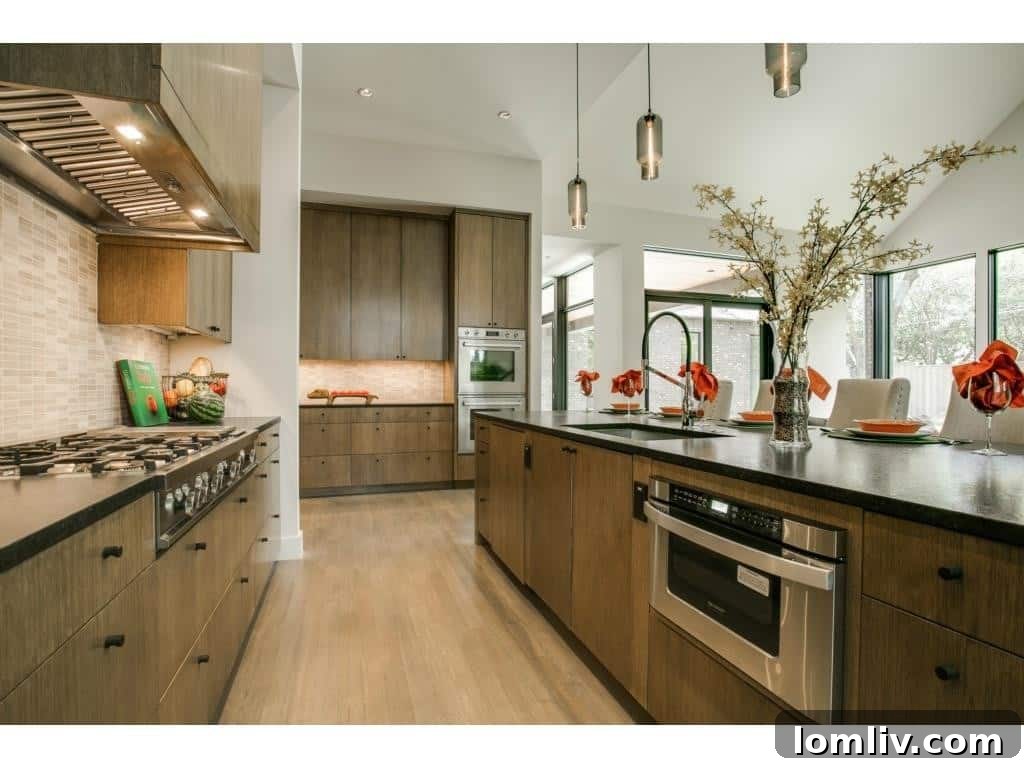 Kitchen view showing farmhouse sink and island