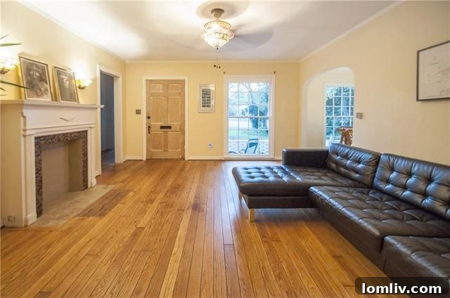 Charming Living Room with Hardwoods in Elmwood Cottage
