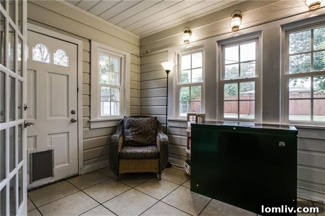 Kitchen view with ceramic tile and stone backsplash