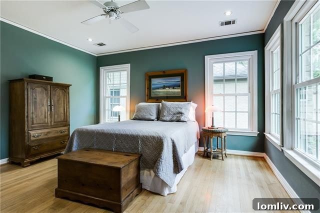 Sunroom leading to laundry area with corrugated metal wall