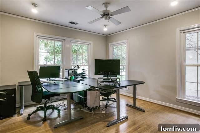 Master bedroom with deep peacock blue walls and large windows