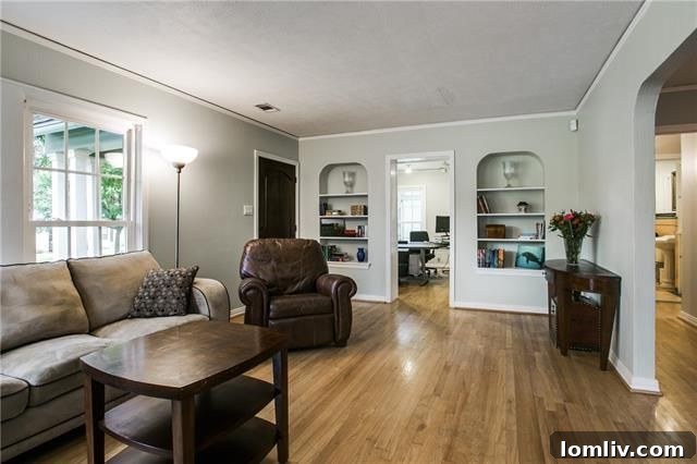 Another angle of the home's exterior with lush greenery