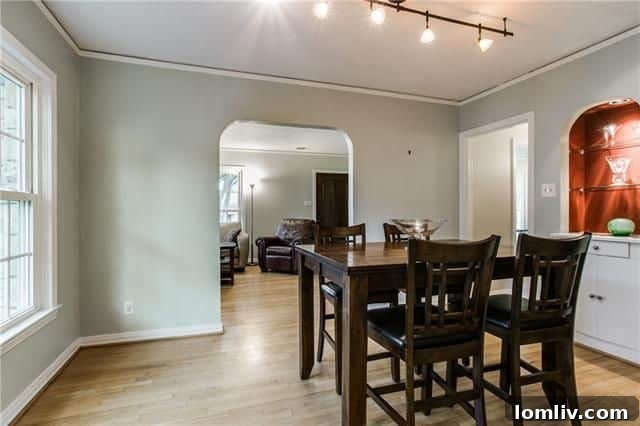 Overview of the front yard with new sod and landscaping