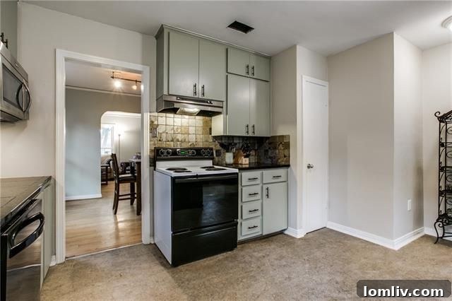 Dining room showing archway to living room