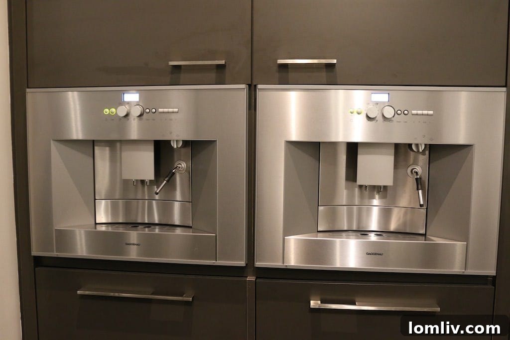 Luxurious modern kitchen with Thermador appliances, showcasing a high-end built-in design.