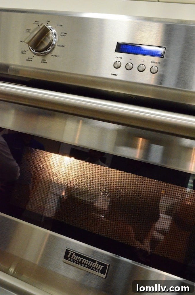 Elegant Thermador Steam Convection Oven in a modern kitchen, ready for gourmet cooking.