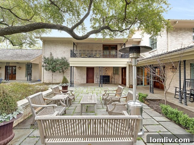 Resort-style pool area with expansive patio, perfect for entertaining in Fort Worth